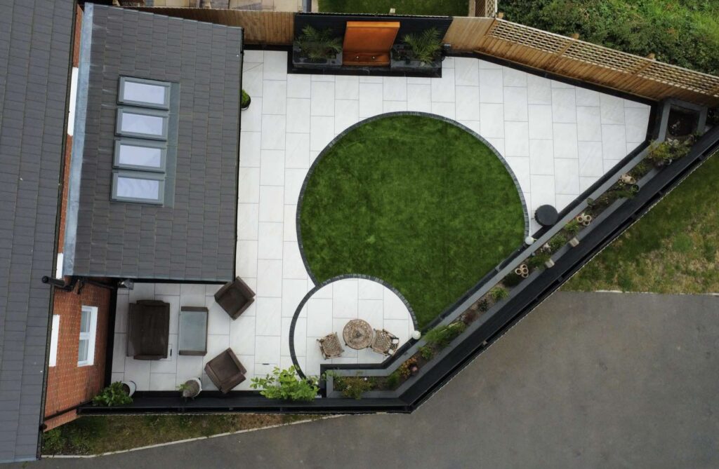 Aerial view of a porcelain garden with a circular lawn