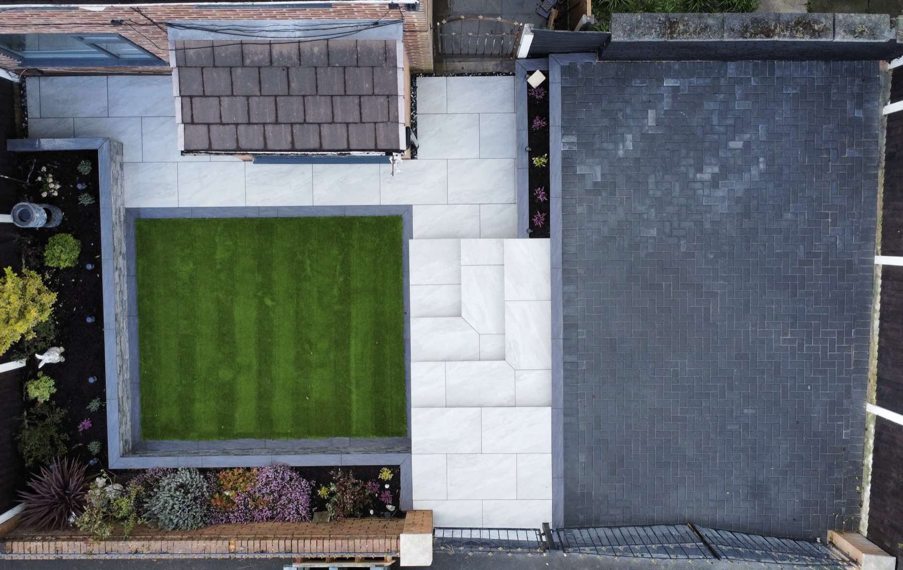 Aerial view of a front garden, porcelain path and driveway