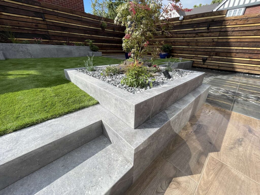 Porcelain steps beside a raised planter