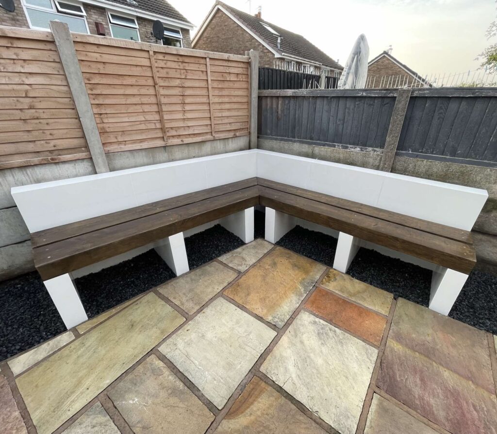 Sandstone patio with a bespoke built-in bench